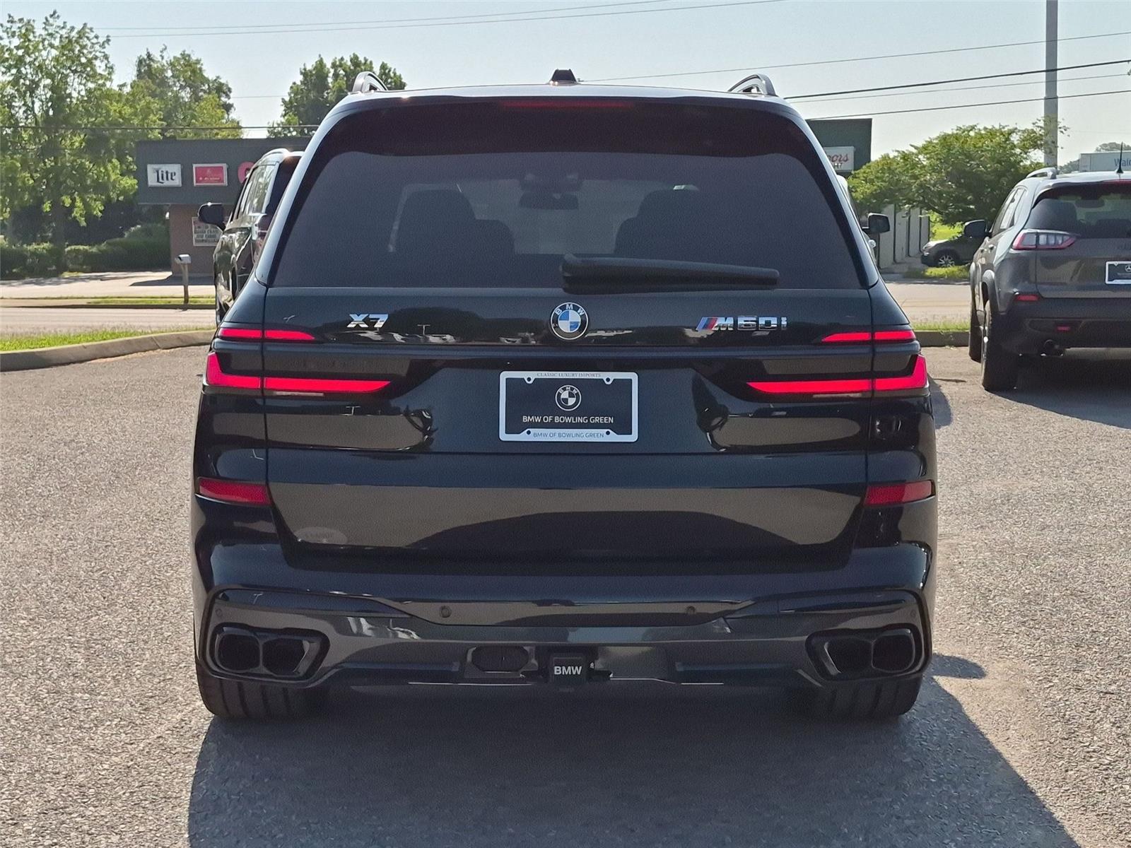 New 2027 Black Sapphire Metallic BMW M60i image 4