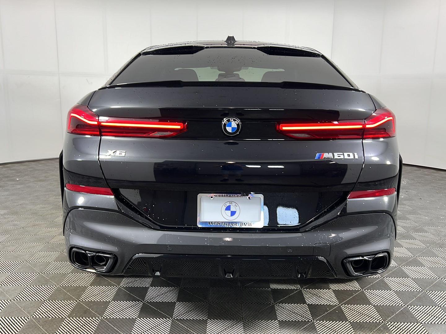New 2027 Black Sapphire Metallic BMW M60i image 16