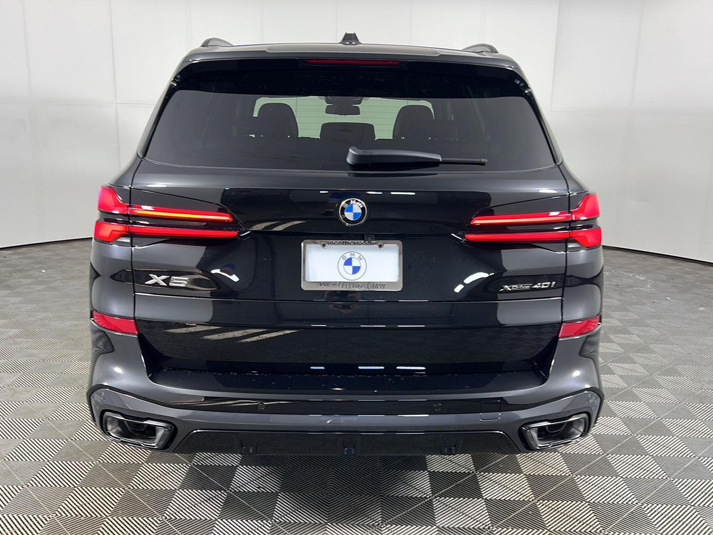New 2026 0475 Black Sapphire Metallic BMW  image 3