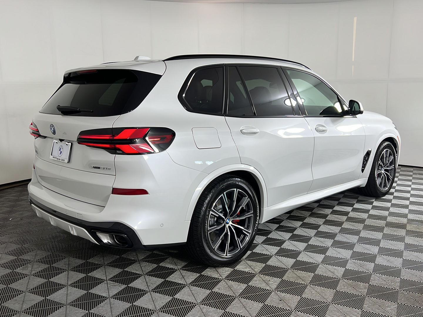 Used 2026 Mineral White Metallic BMW xDrive50e image 5