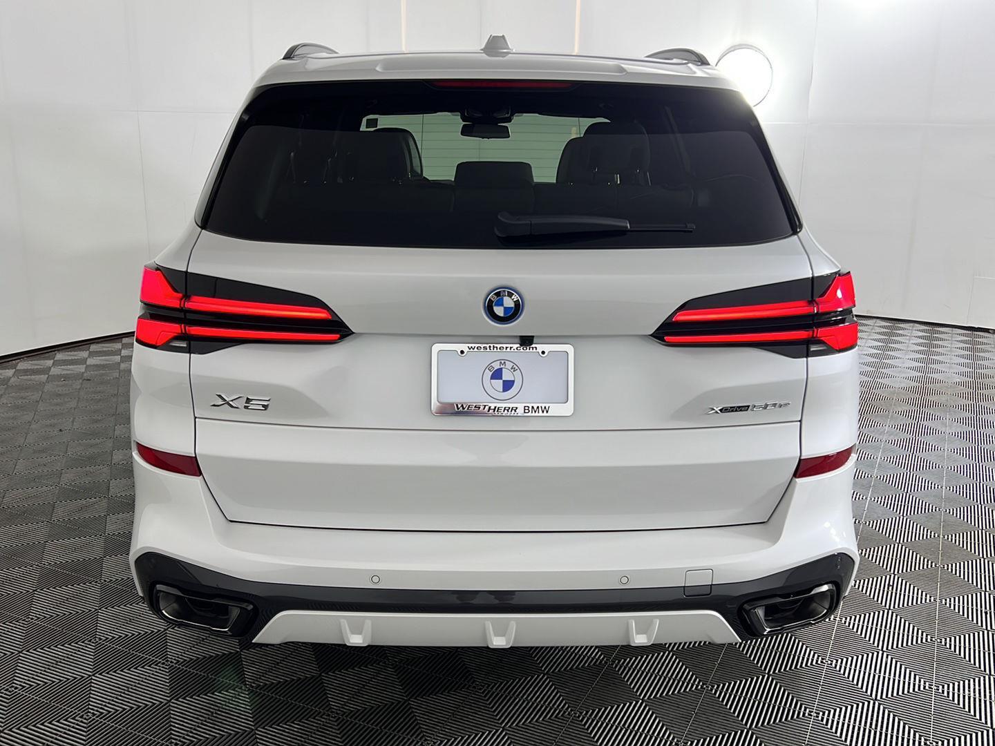 Used 2026 Mineral White Metallic BMW xDrive50e image 6