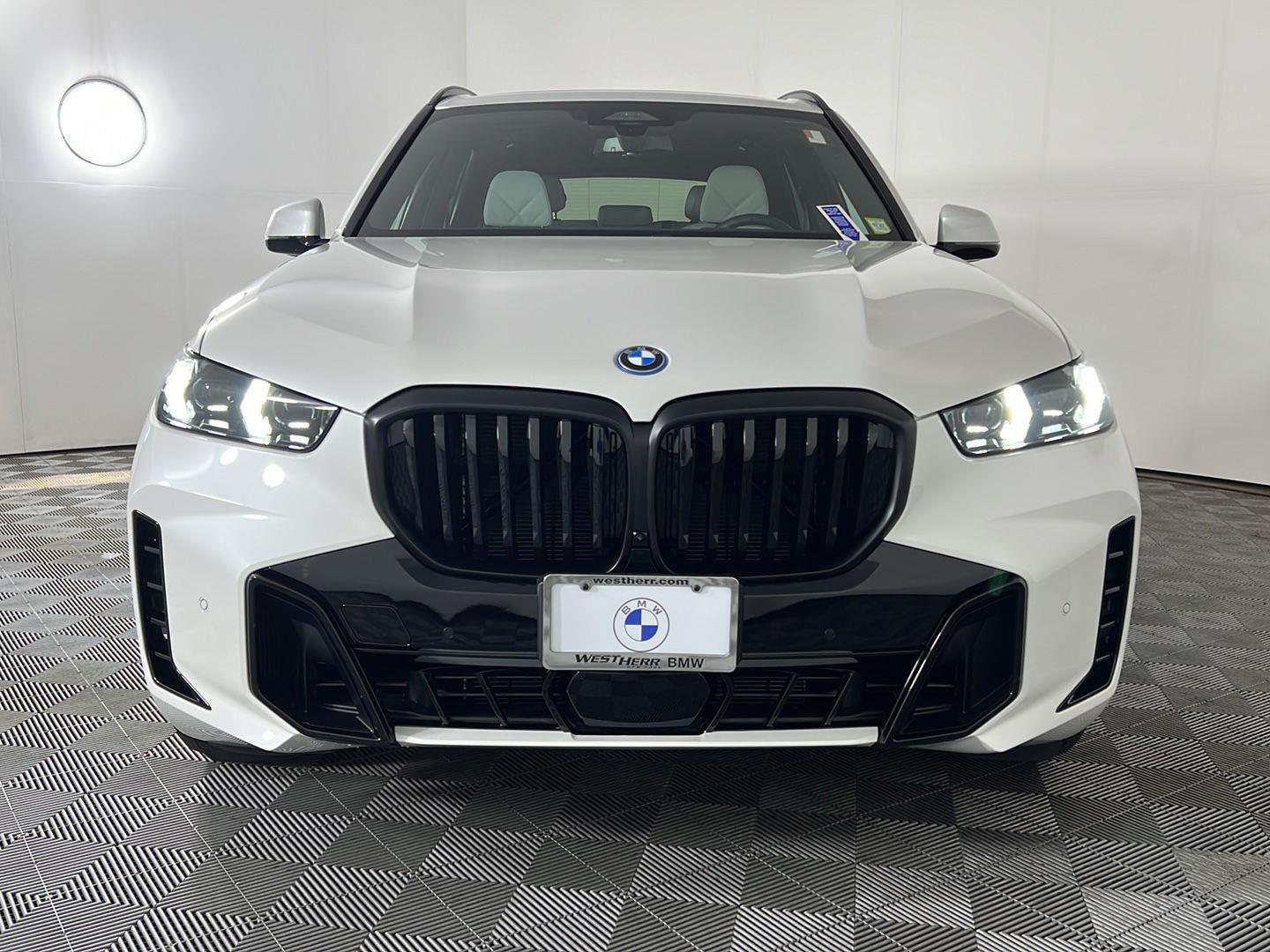 Used 2026 Mineral White Metallic BMW xDrive50e image 13