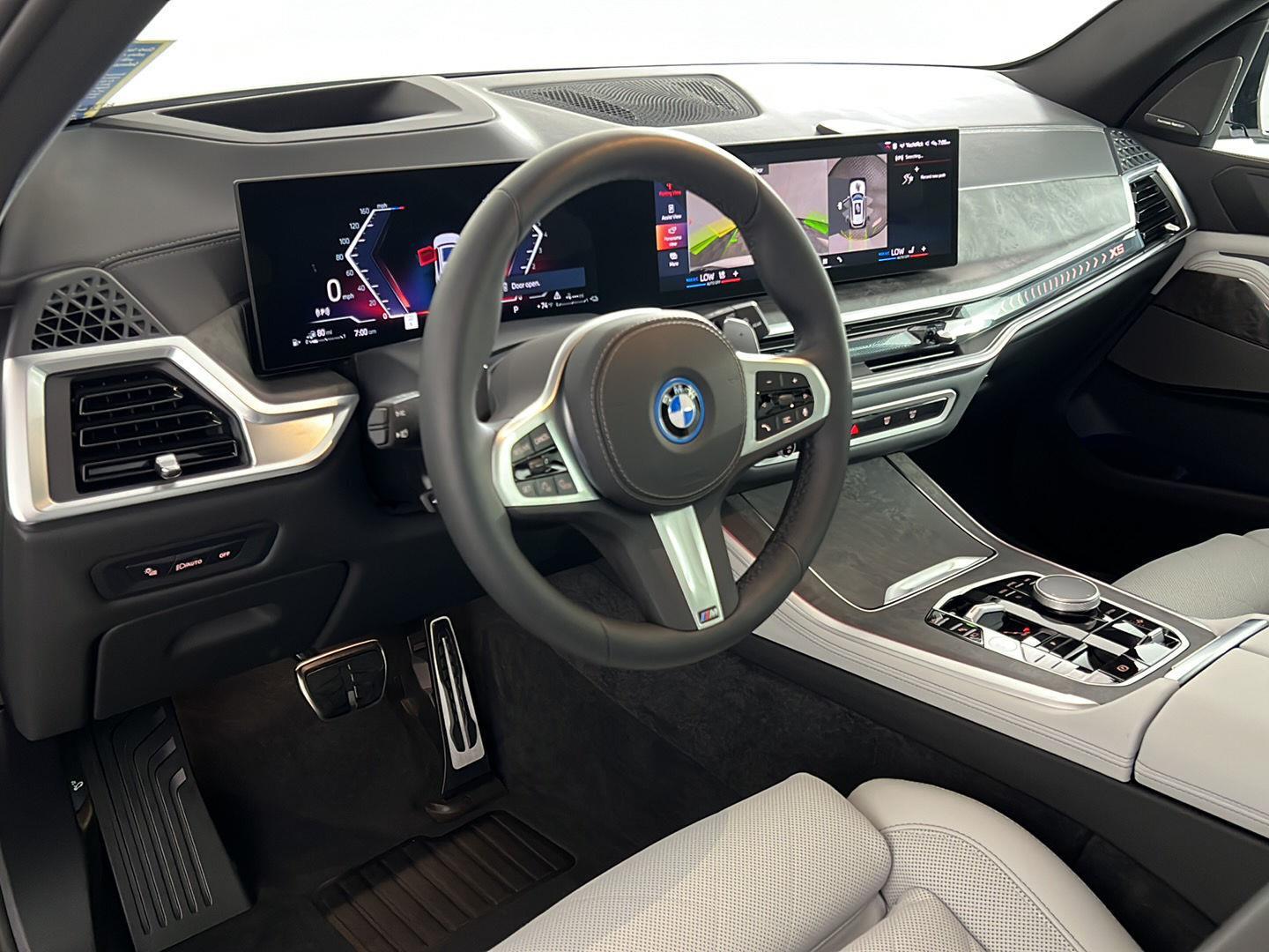 Used 2026 Mineral White Metallic BMW xDrive50e image 2