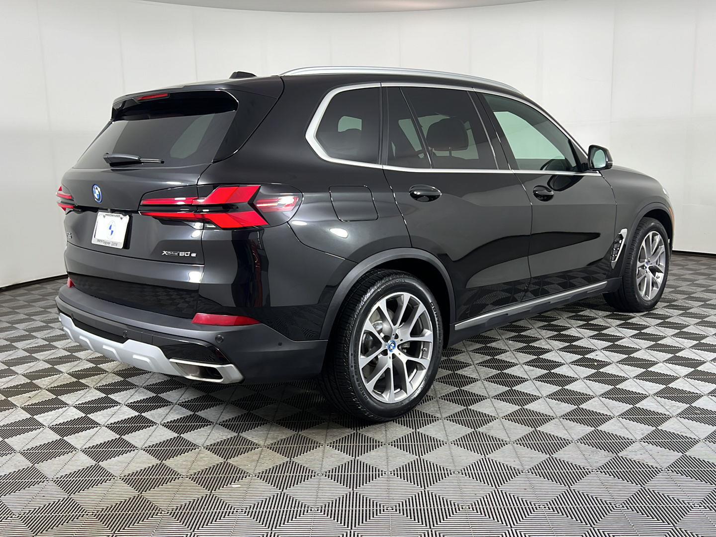Certified Used 2024 Black Sapphire Metallic BMW xDrive50e image 5