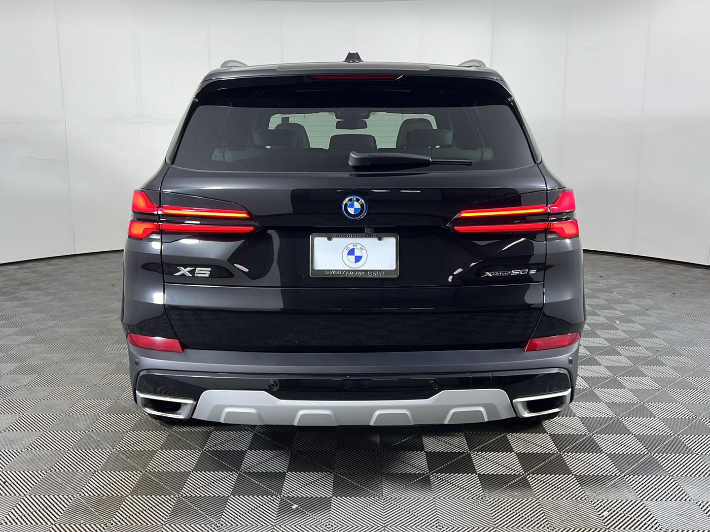 Certified Used 2024 Black Sapphire Metallic BMW xDrive50e image 6