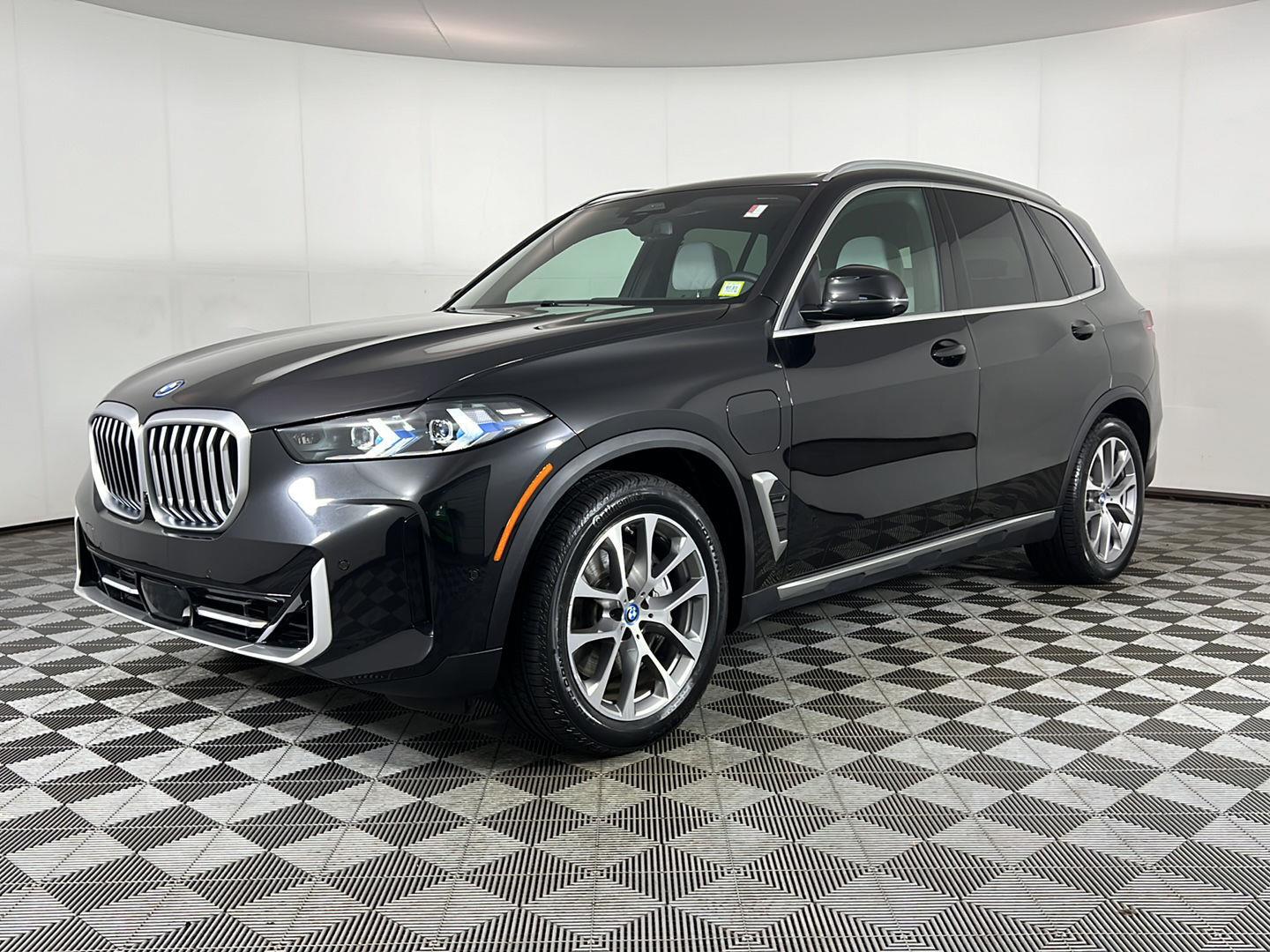 Certified Used 2024 Black Sapphire Metallic BMW xDrive50e image 10