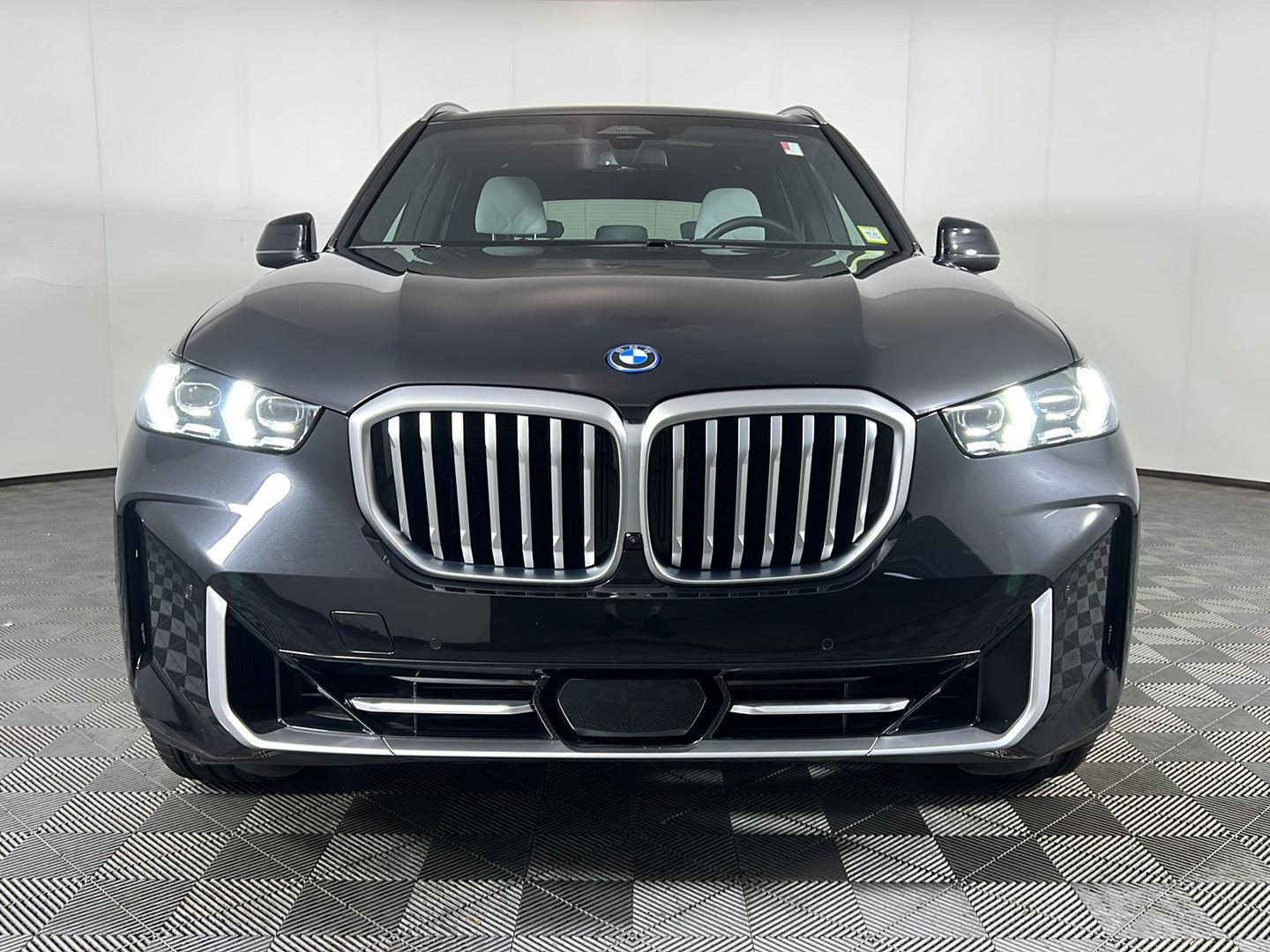 Certified Used 2024 Black Sapphire Metallic BMW xDrive50e image 11