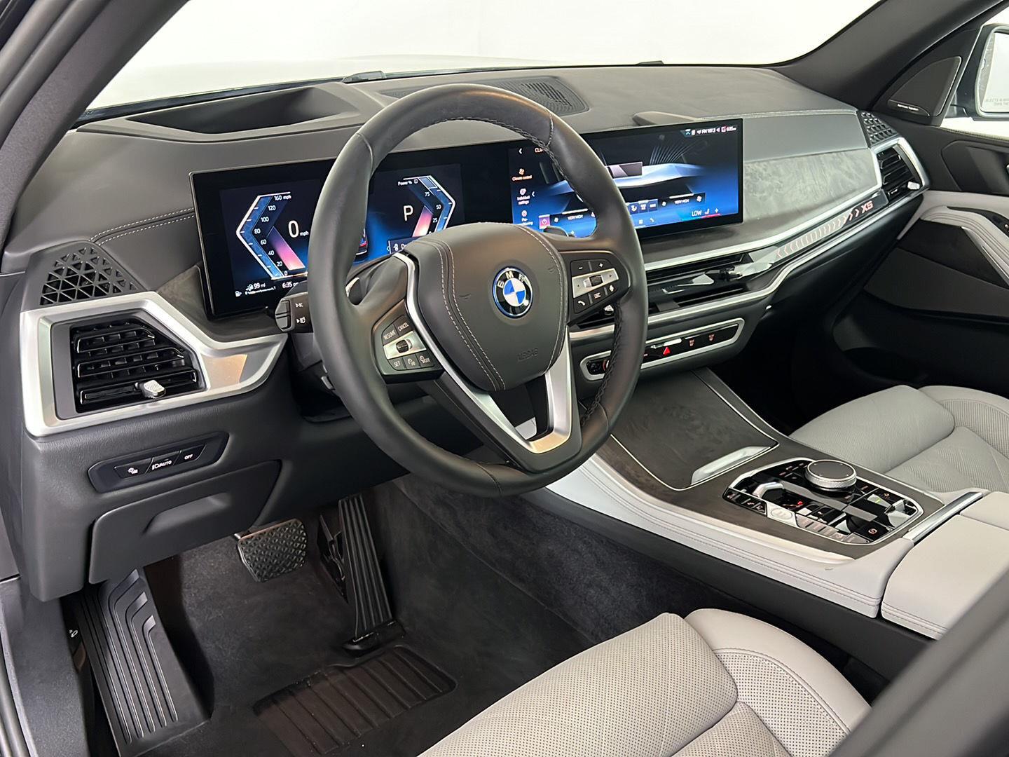 Certified Used 2024 Black Sapphire Metallic BMW xDrive50e image 2
