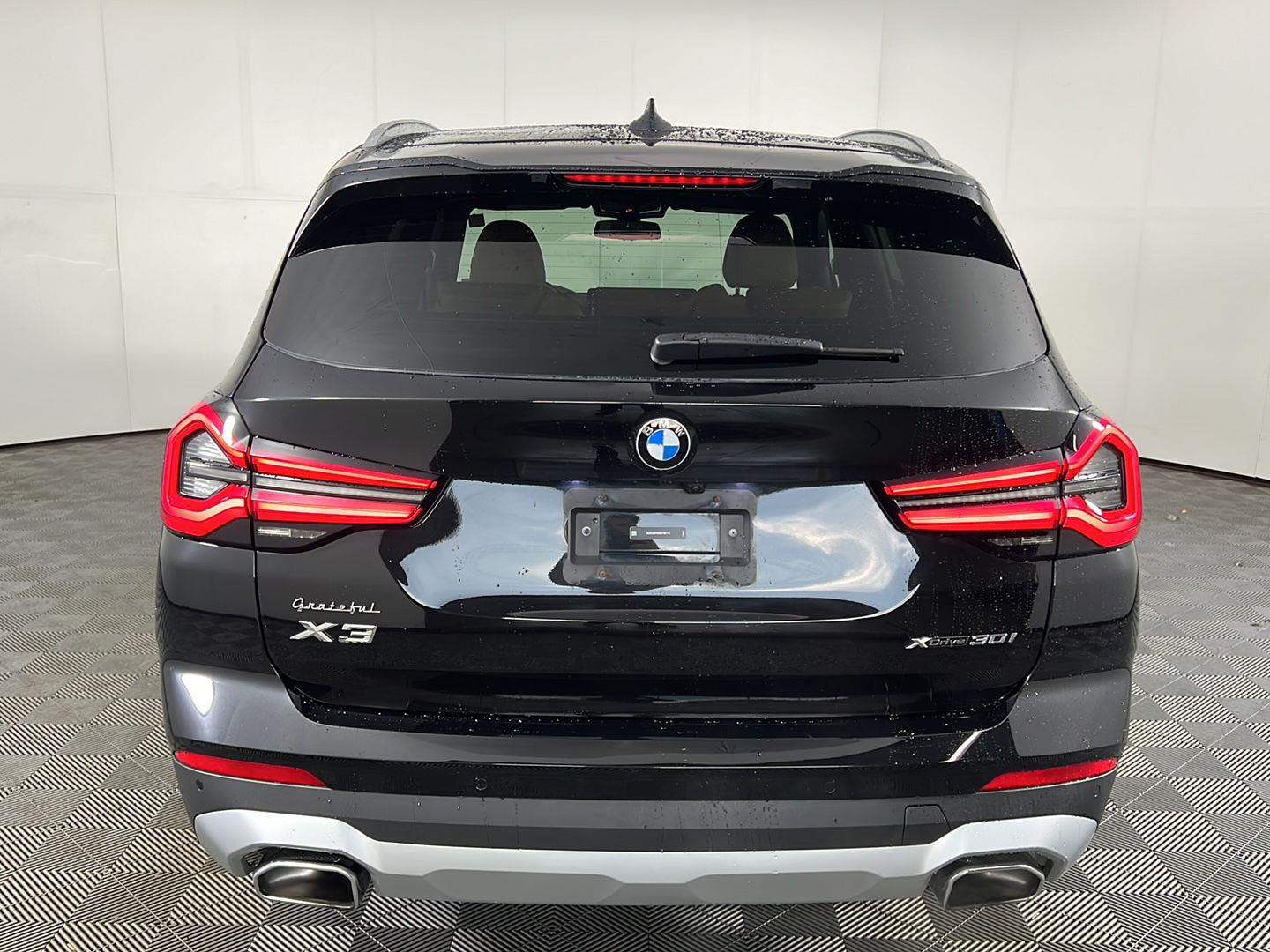 Certified Used 2024 Black Sapphire Metallic BMW xDrive30i image 6