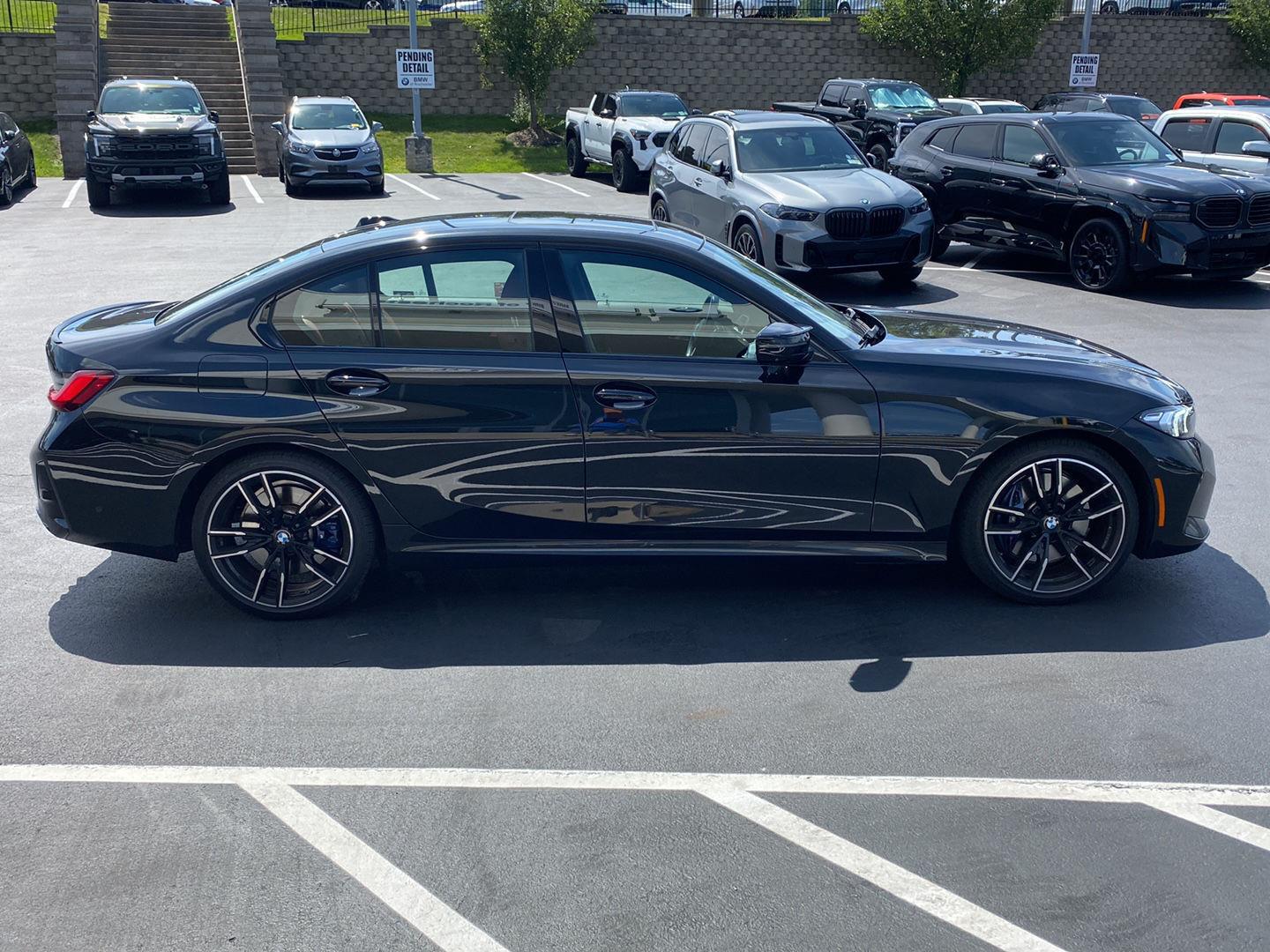 Used 2023 Black Sapphire Metallic BMW M340i xDrive image 2