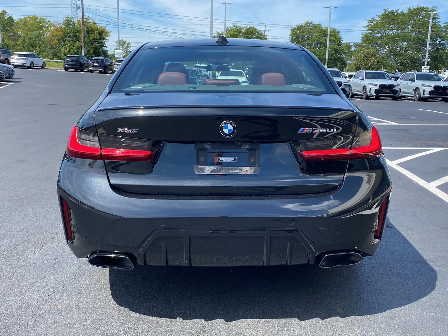 Used 2023 Black Sapphire Metallic BMW M340i xDrive image 4
