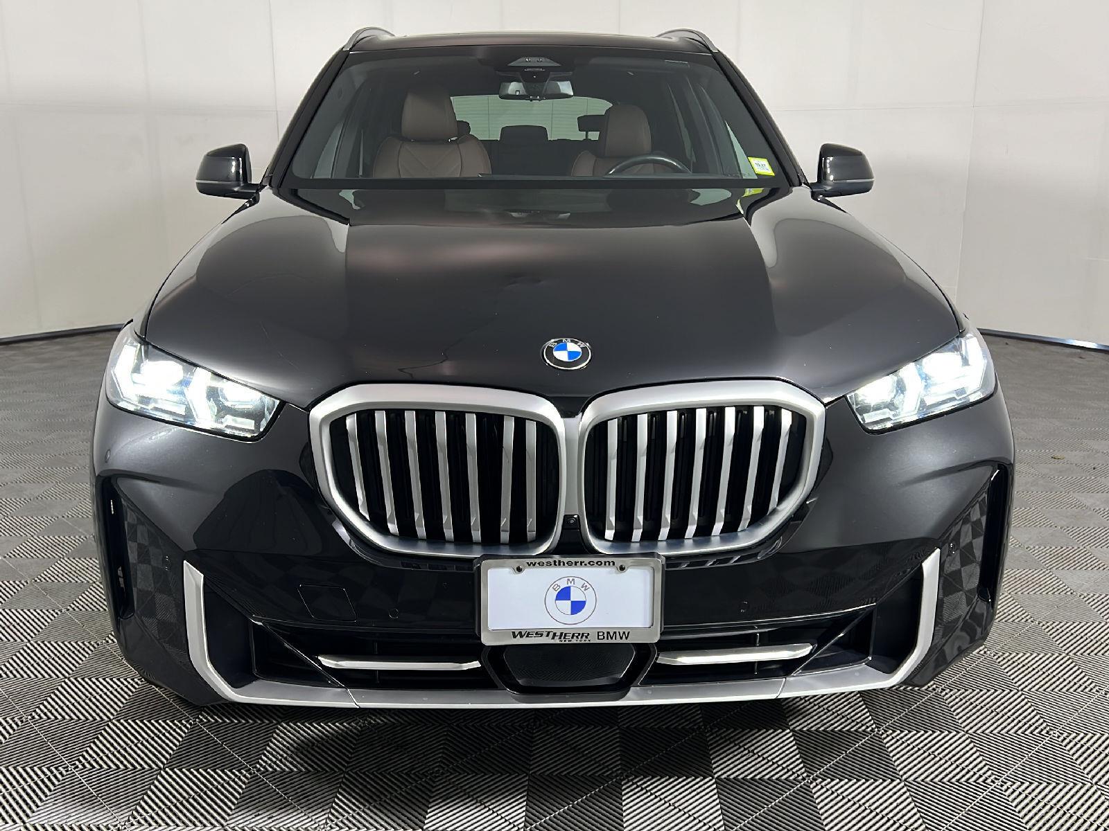 Used 2025 Black Sapphire Metallic BMW xDrive40i image 13