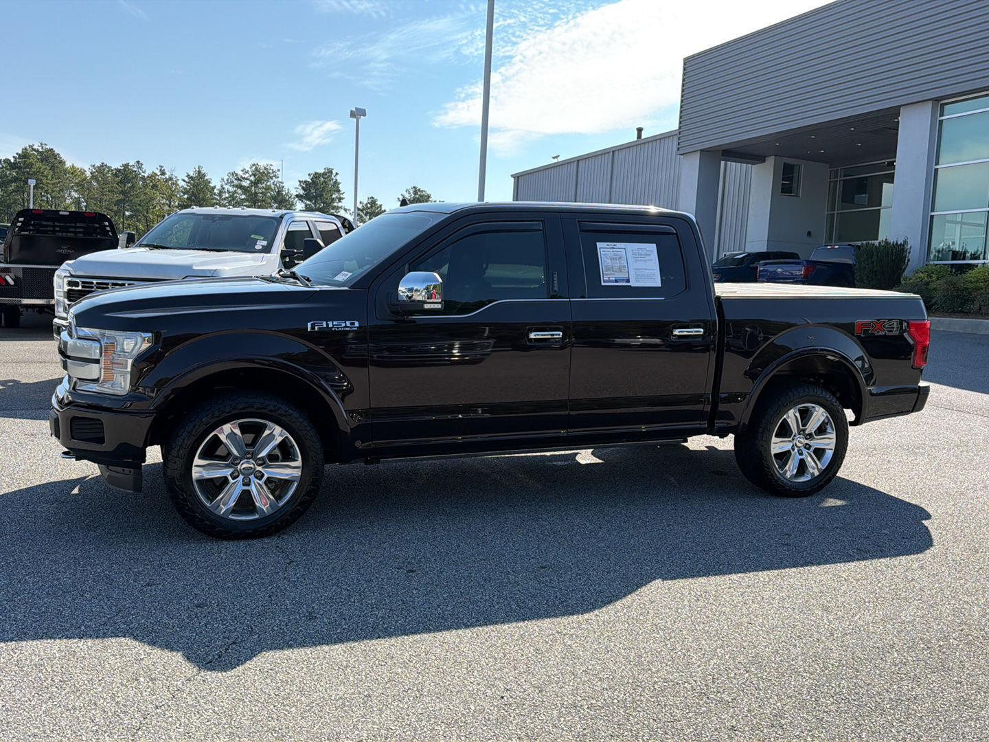 View vehicle photo 3