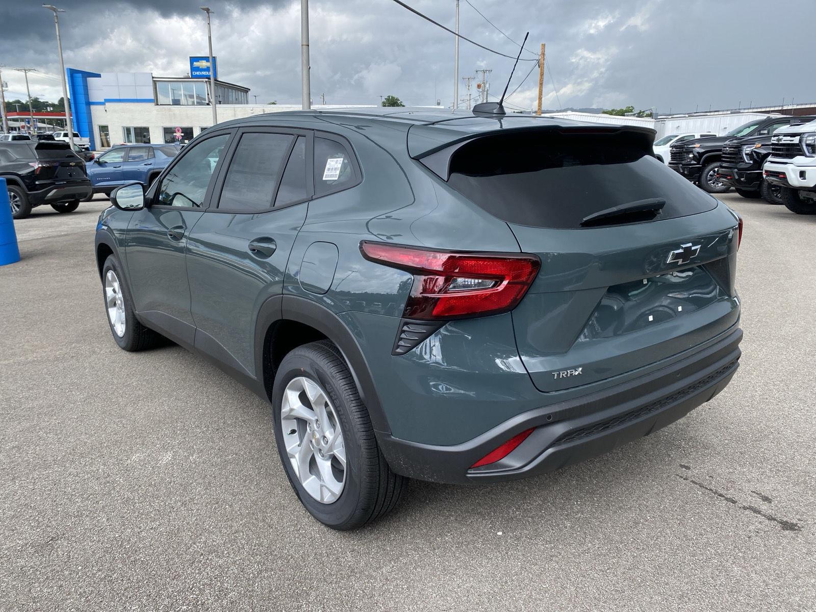 View vehicle photo 3