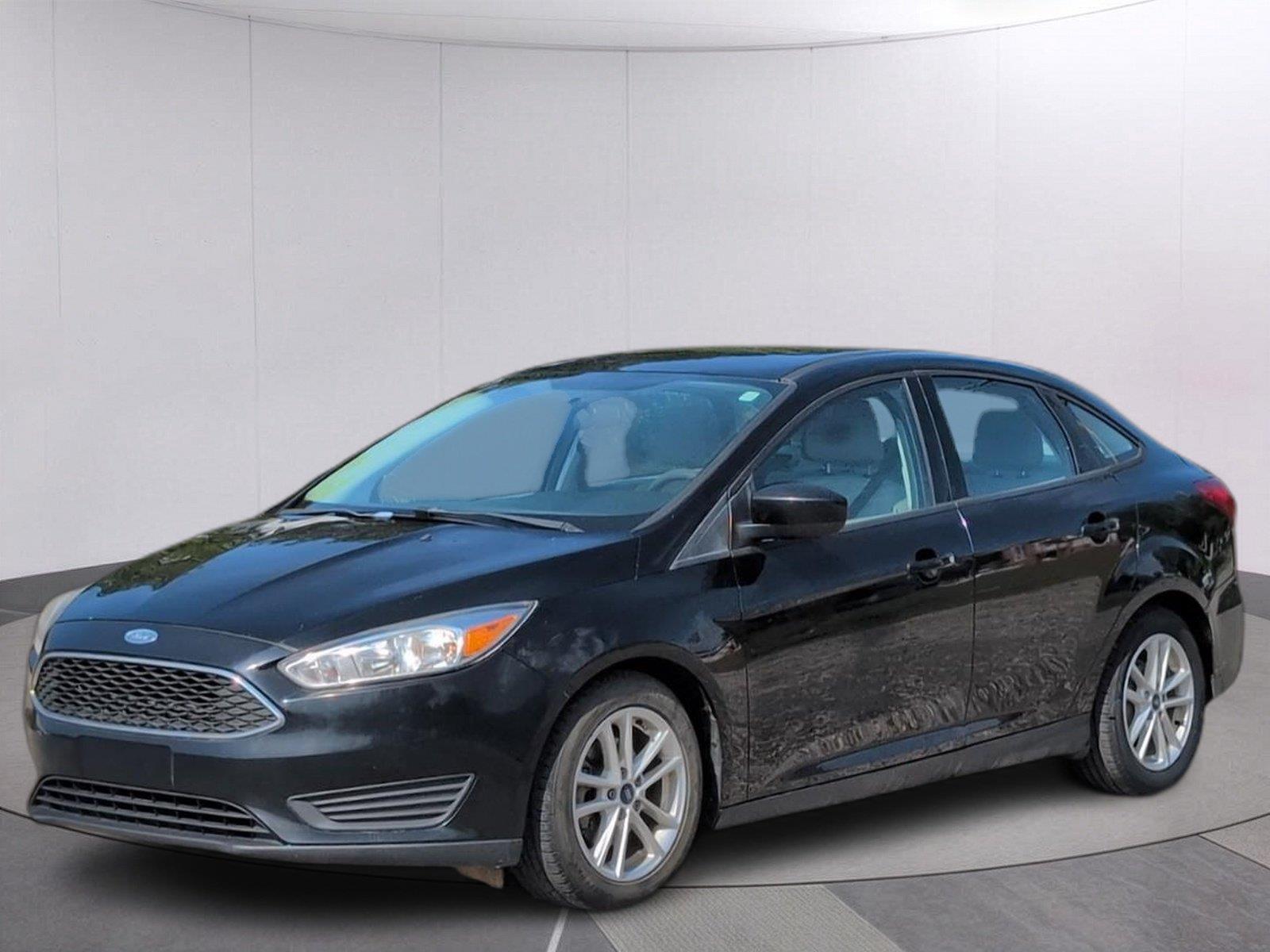 Shadow Black 2018 Ford Focus Sedan Front-Wheel Drive 6-Speed Automatic