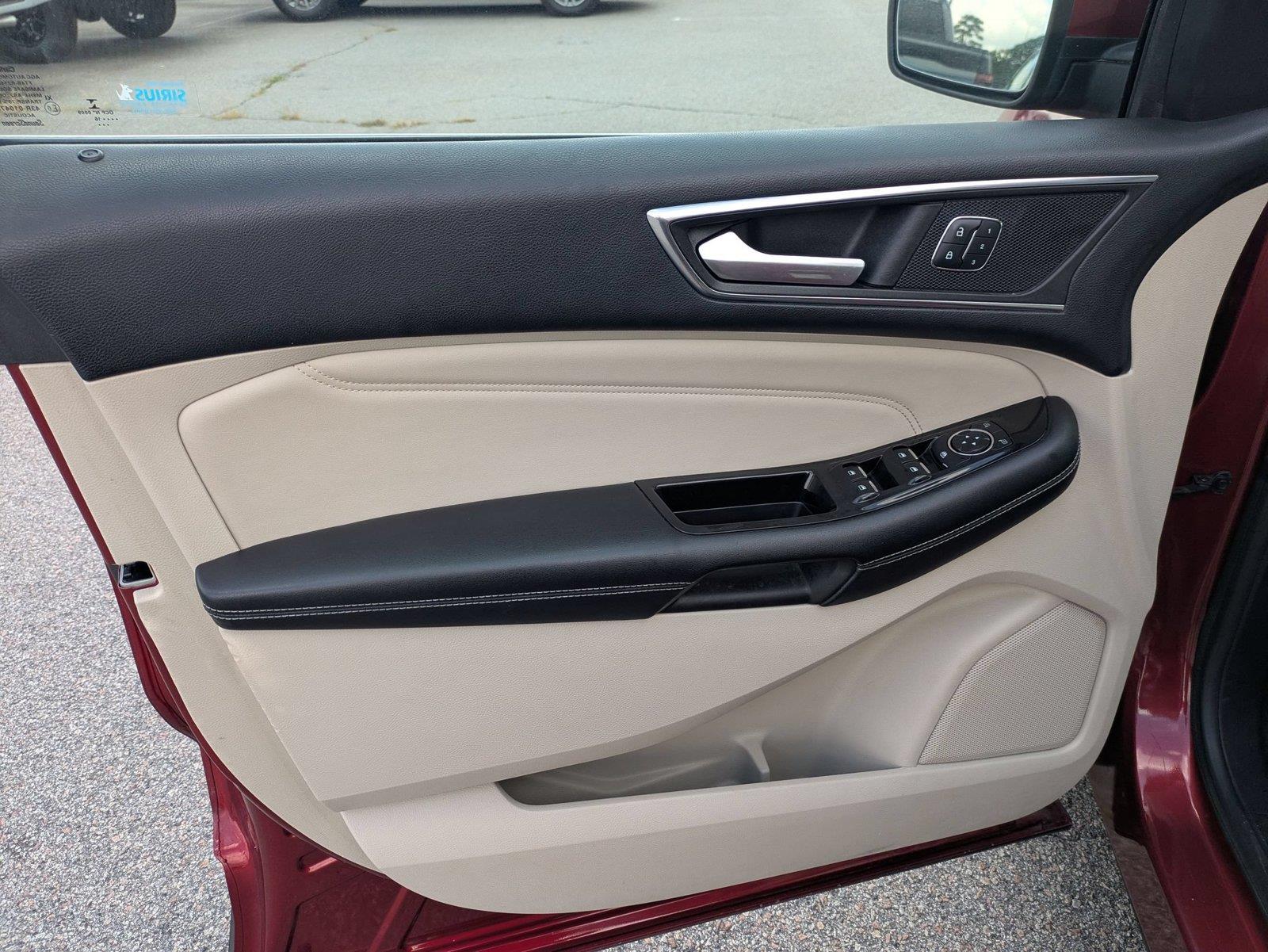Used 2016 Ruby Red Metallic Tinted Clearcoat Ford Titanium image 11