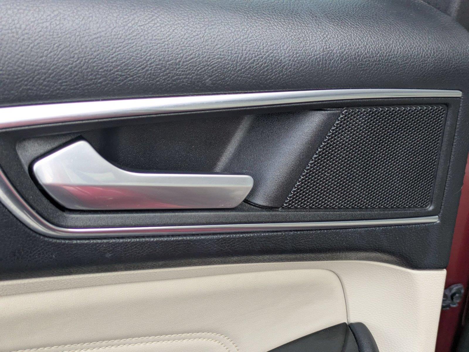 Used 2016 Ruby Red Metallic Tinted Clearcoat Ford Titanium image 28