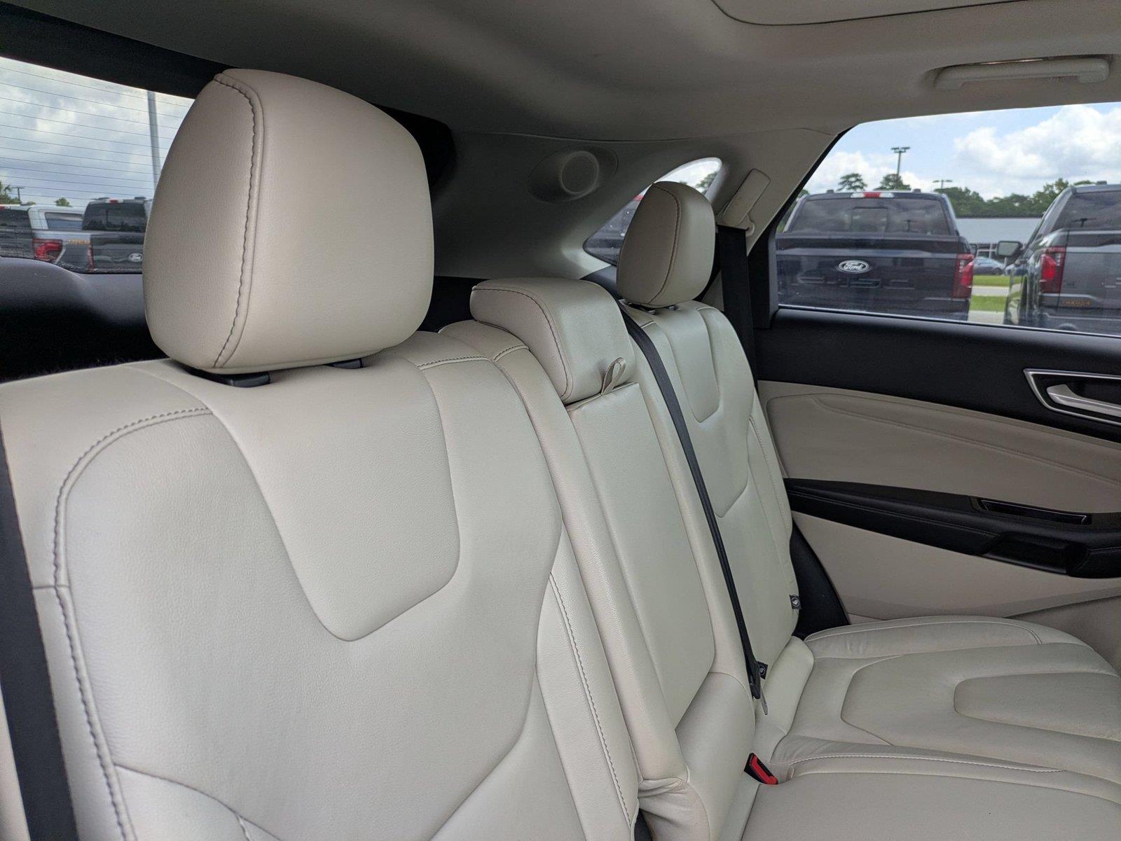 Used 2016 Ruby Red Metallic Tinted Clearcoat Ford Titanium image 30
