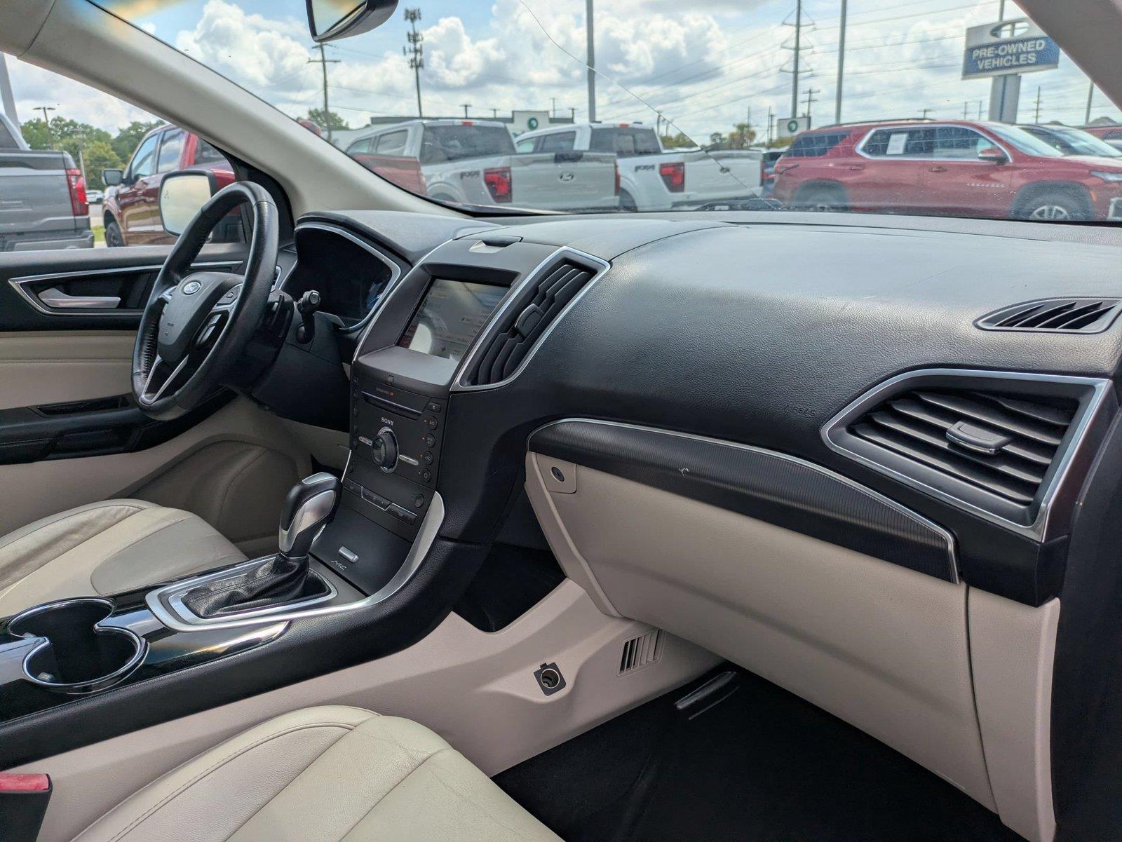 Used 2016 Ruby Red Metallic Tinted Clearcoat Ford Titanium image 36