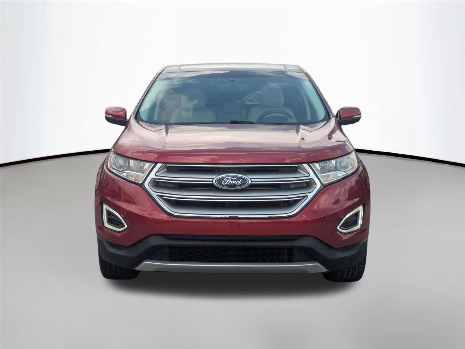 Used 2016 Ruby Red Metallic Tinted Clearcoat Ford Titanium image 2