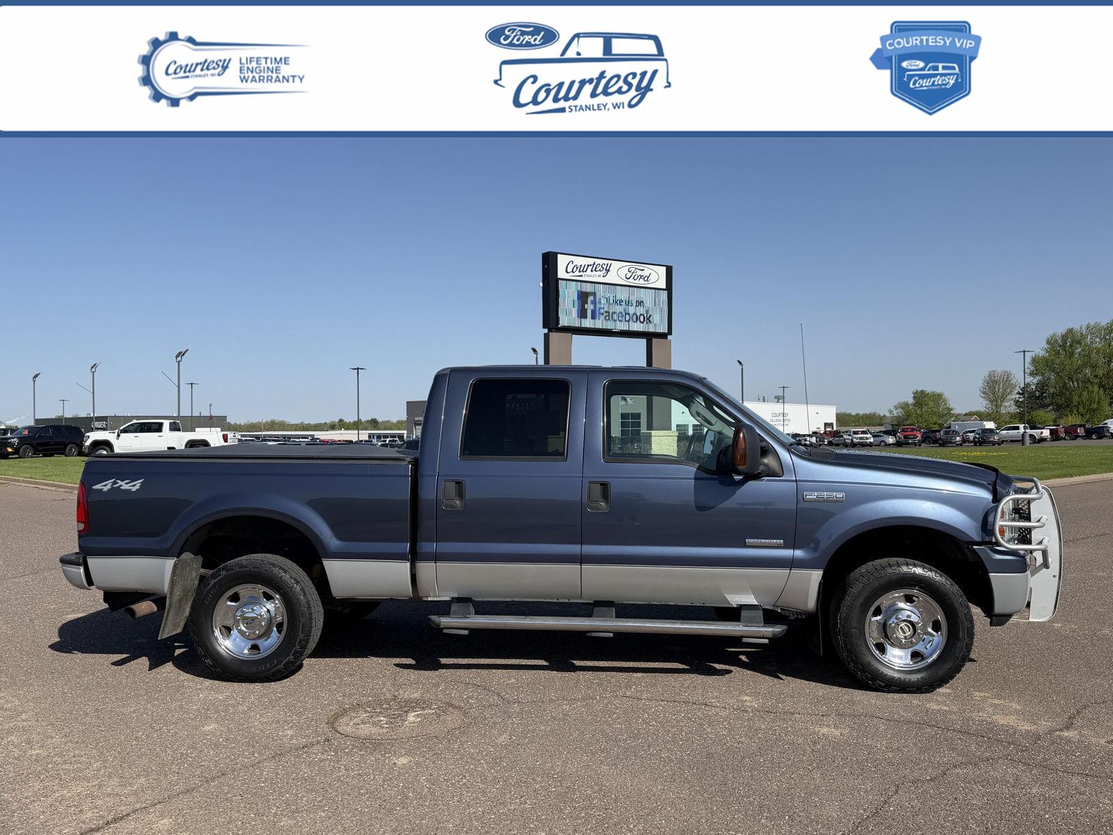 Blue 2006 Ford F-250 Super Duty XL Crew Cab 4WD Pickup Truck Four-Wheel Drive 6-Speed Manual Overdrive