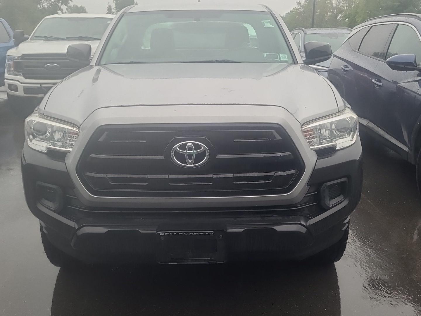 Silver Sky Metallic 2017 Toyota Tacoma Pickup Truck Four-Wheel Drive 5-Speed Manual