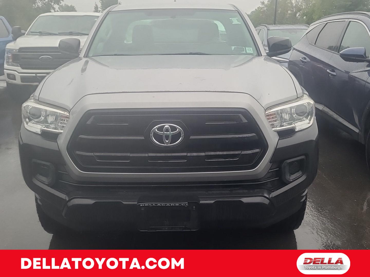 Silver Sky Metallic 2017 Toyota Tacoma Pickup Truck Four-Wheel Drive 5-Speed Manual