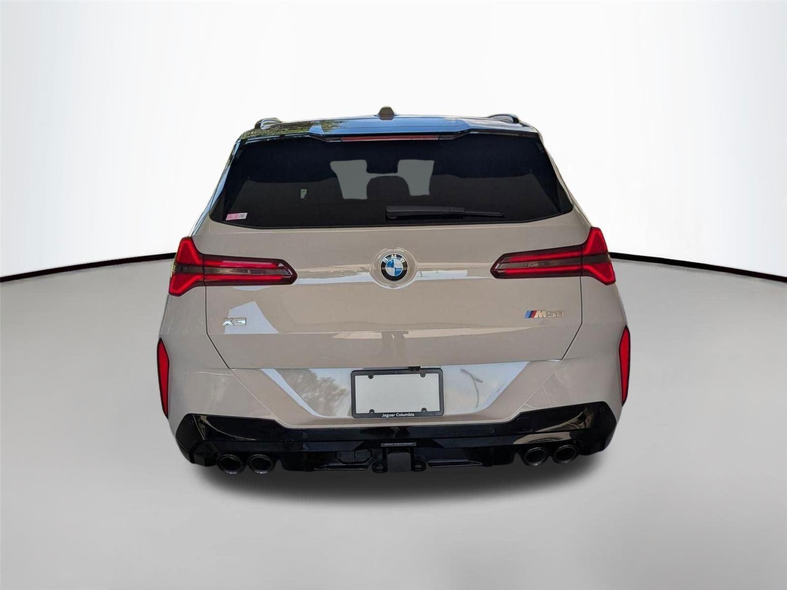 Used 2025 Dune Grey Metallic BMW M50 xDrive image 6
