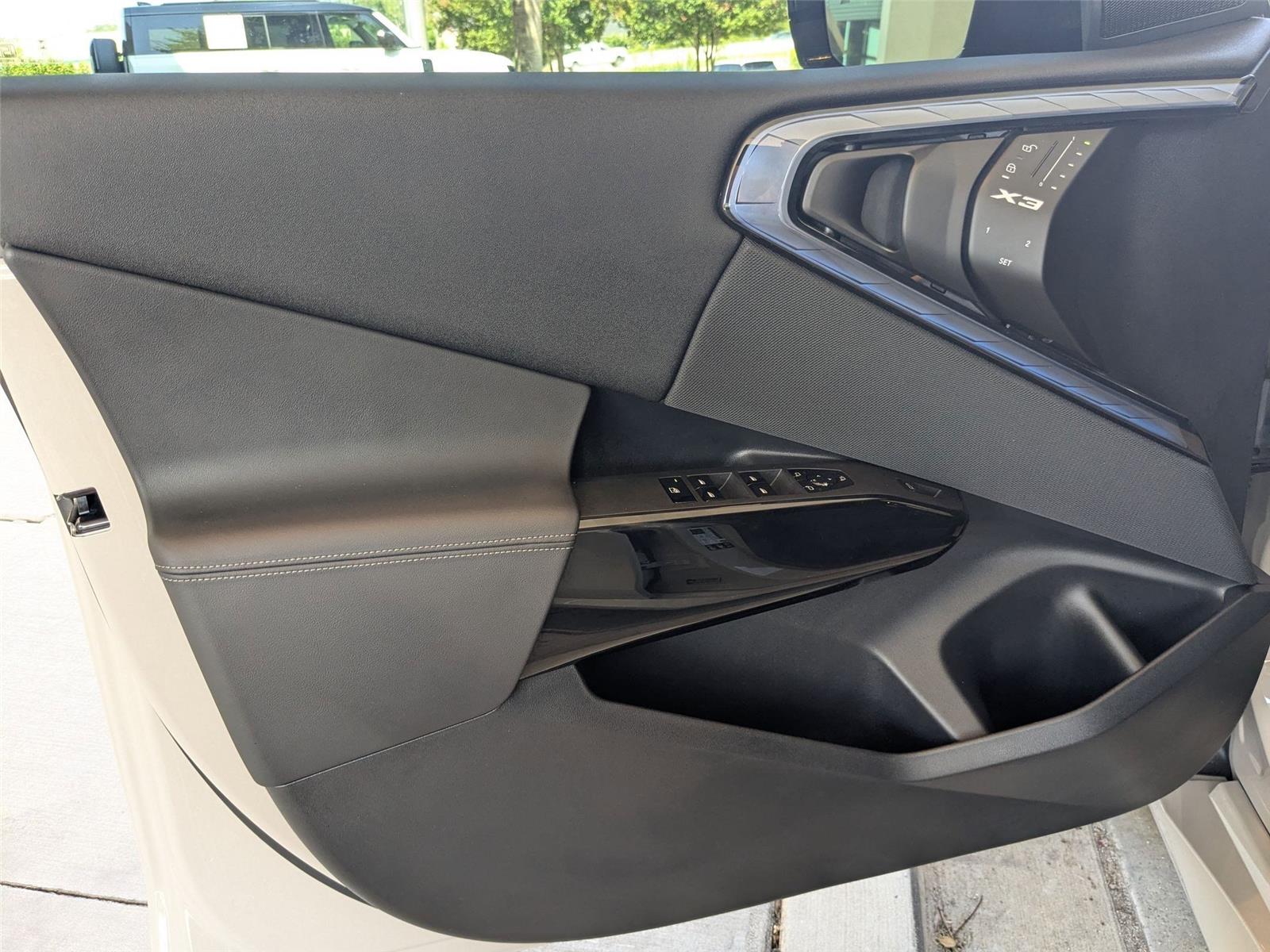 Used 2025 Dune Grey Metallic BMW M50 xDrive image 11