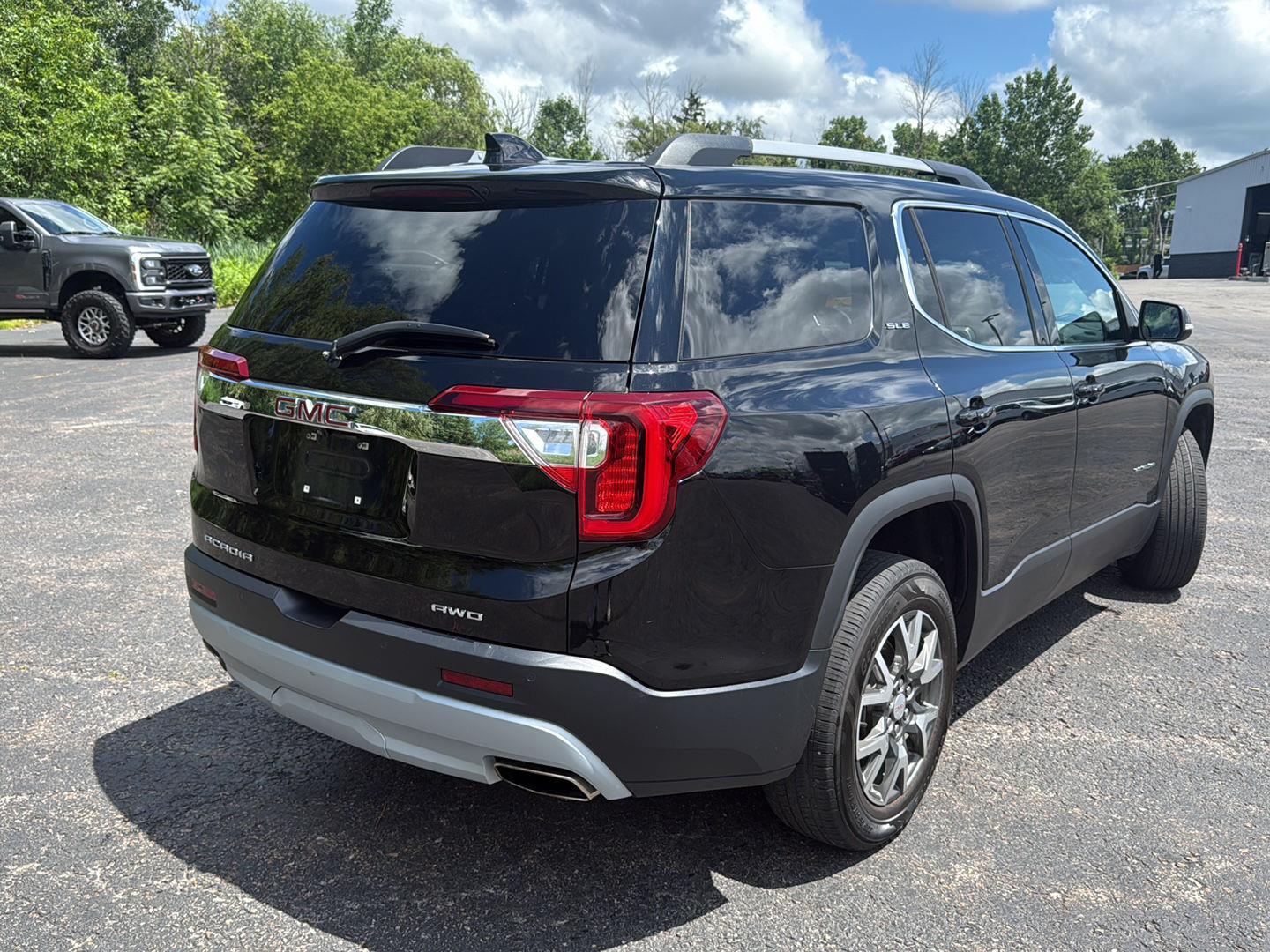 Used 2022 Ebony Twilight Metallic GMC SLE image 9
