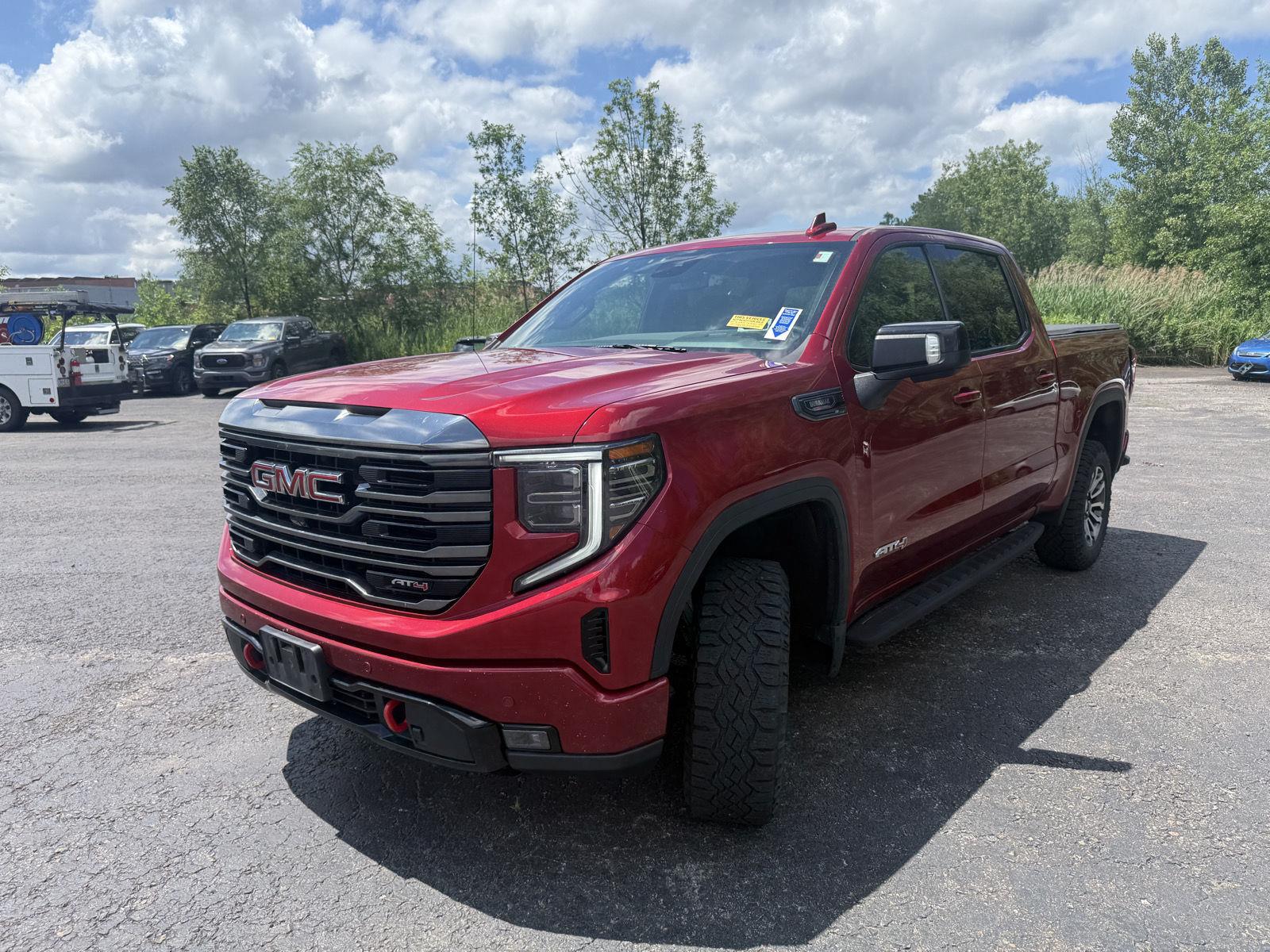 Used 2023 Volcanic Red Tintcoat GMC AT4 image 8