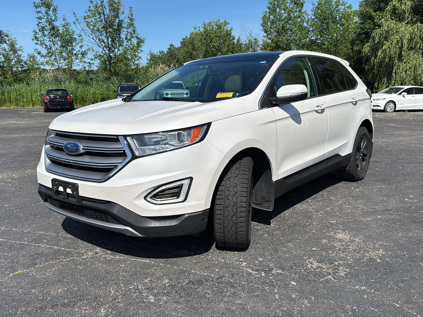 Used 2016 White Platinum Metallic Tri-Coat Ford SEL image 2