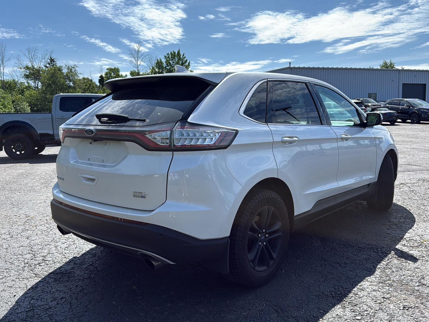 Used 2016 White Platinum Metallic Tri-Coat Ford SEL image 4