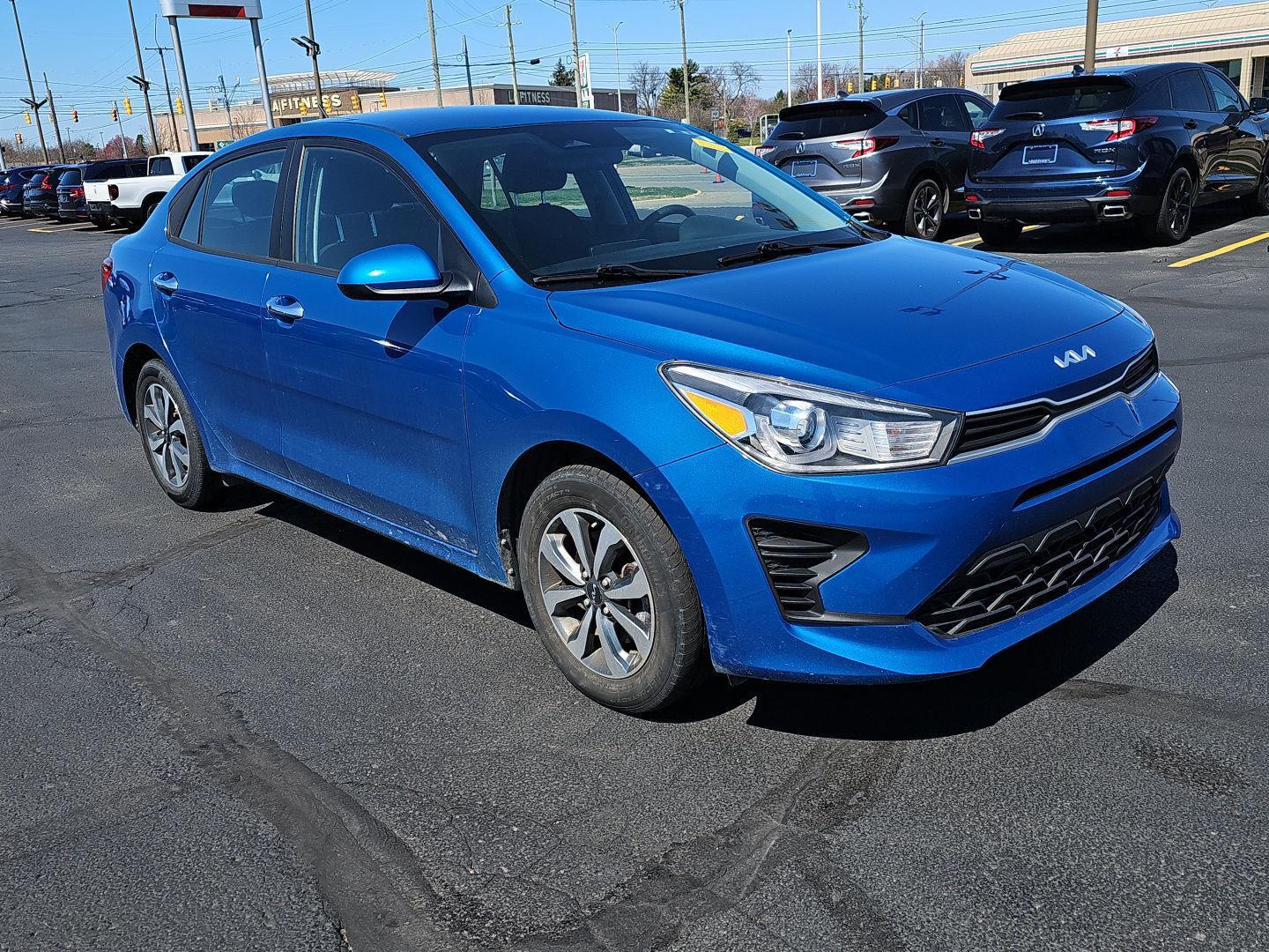 Sporty Blue 2023 Kia Rio S FWD Sedan Front-Wheel Drive Continuously Variable Transmission