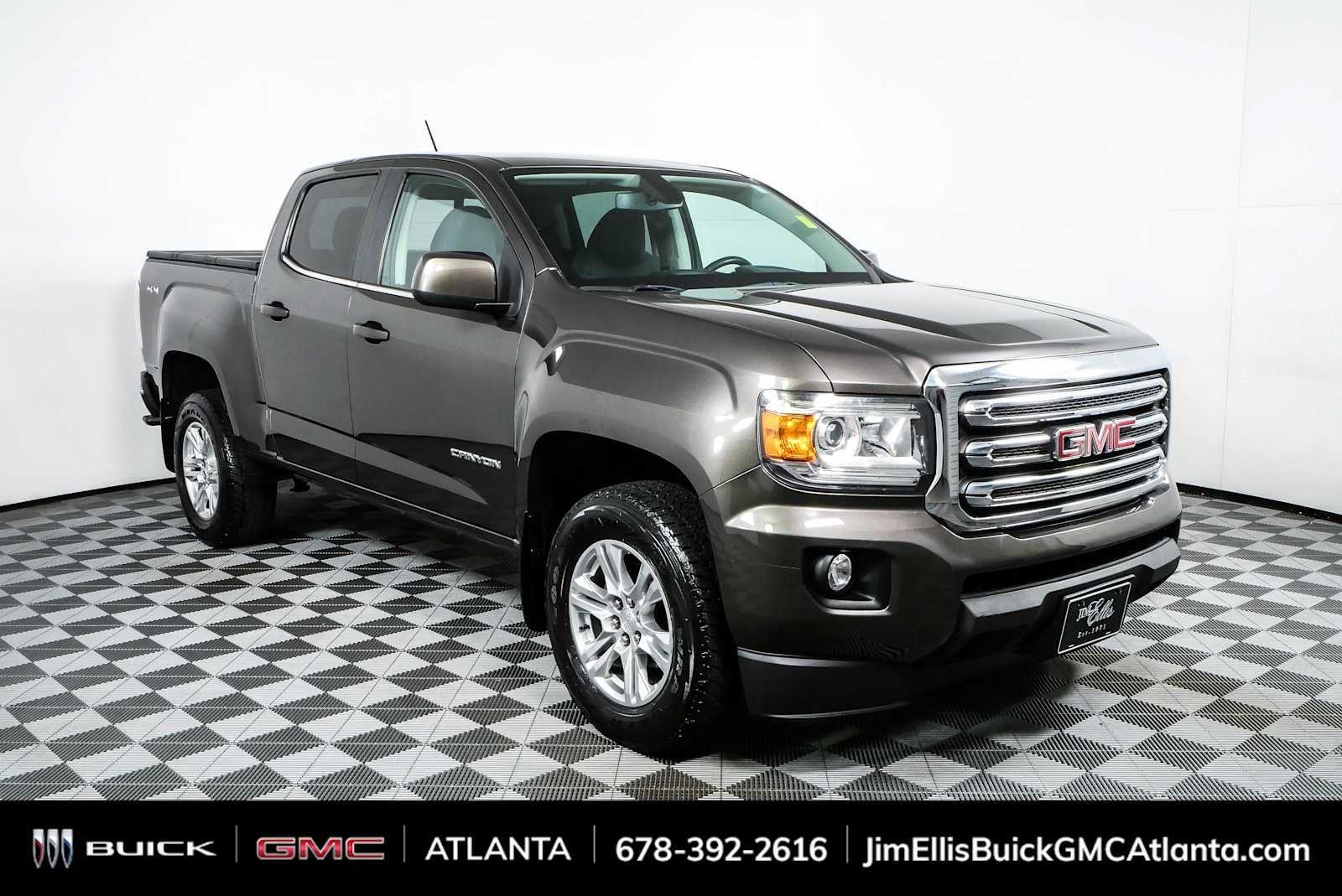 Smokey Quartz Metallic 2019 GMC Canyon Pickup Truck Four-Wheel Drive 8-Speed Automatic