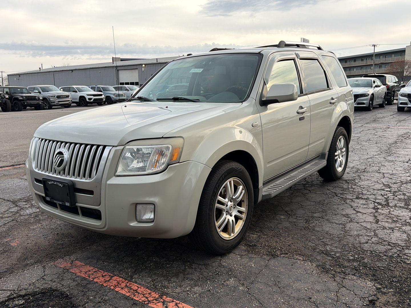 Gray 2009 Mercury Mariner Premier V6 4WD SUV / Crossover All-Wheel Drive 6-Speed Automatic Overdrive