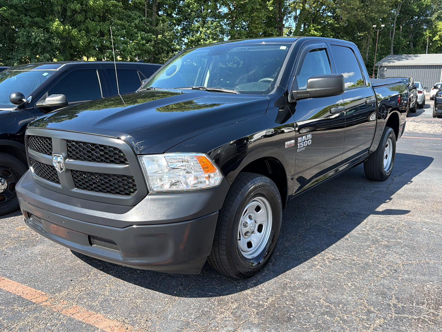 Diamond Black Crystal Pearlcoat 2023 RAM 1500 Classic SSV Crew Cab 4WD Pickup Truck Four-Wheel Drive 8-Speed Automatic