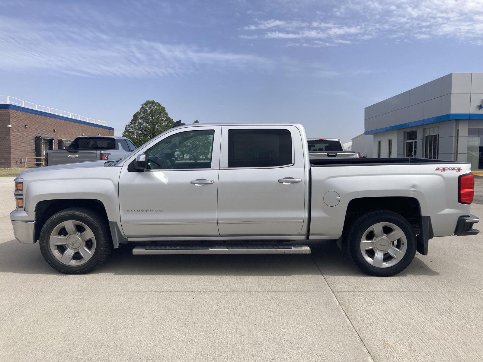 Silver Ice Metallic 2015 Chevrolet Silverado 1500 LTZ Crew Cab 4WD Pickup Truck Four-Wheel Drive 8-Speed Automatic