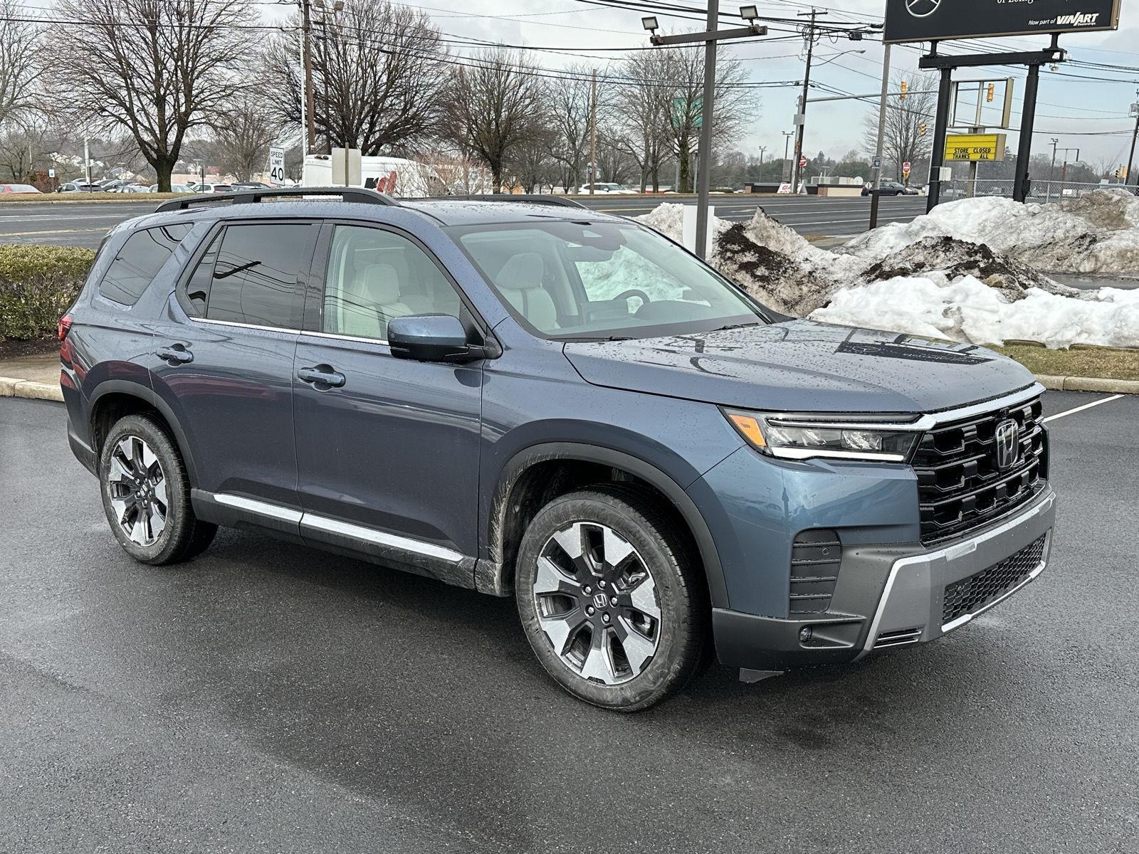 View vehicle photo 2