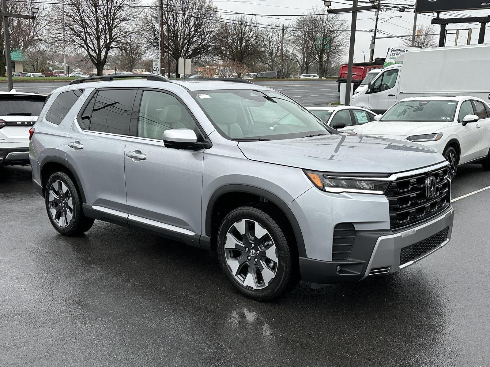 View vehicle photo 2