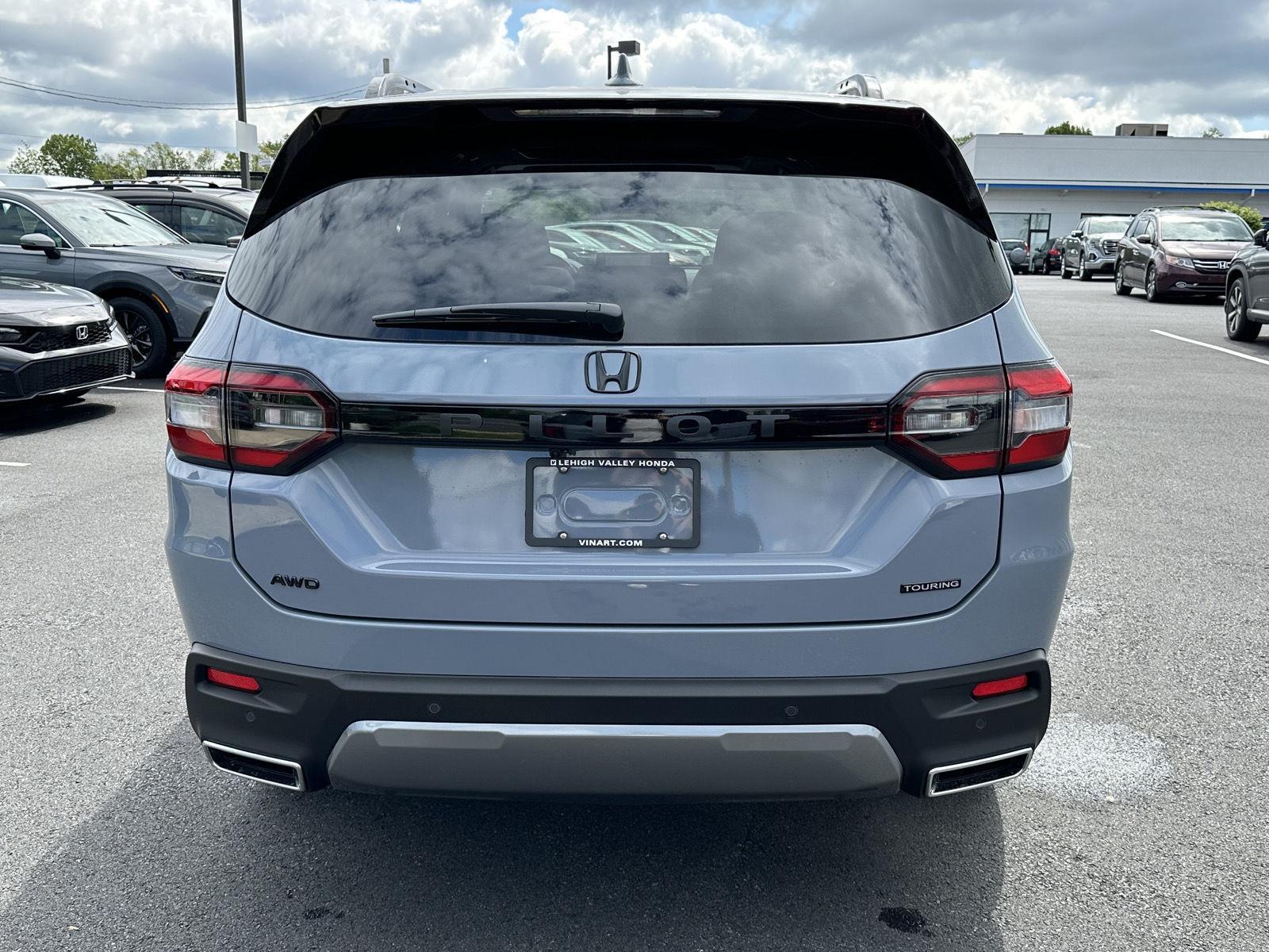 View vehicle photo 6
