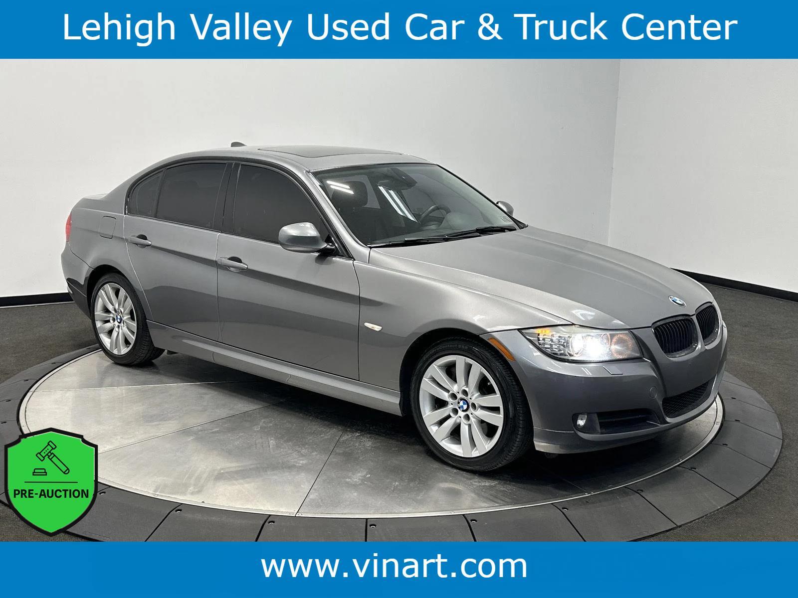 Space Gray Metallic 2011 BMW 3 Series 335i xDrive Sedan AWD Sedan All-Wheel Drive 6-Speed Manual