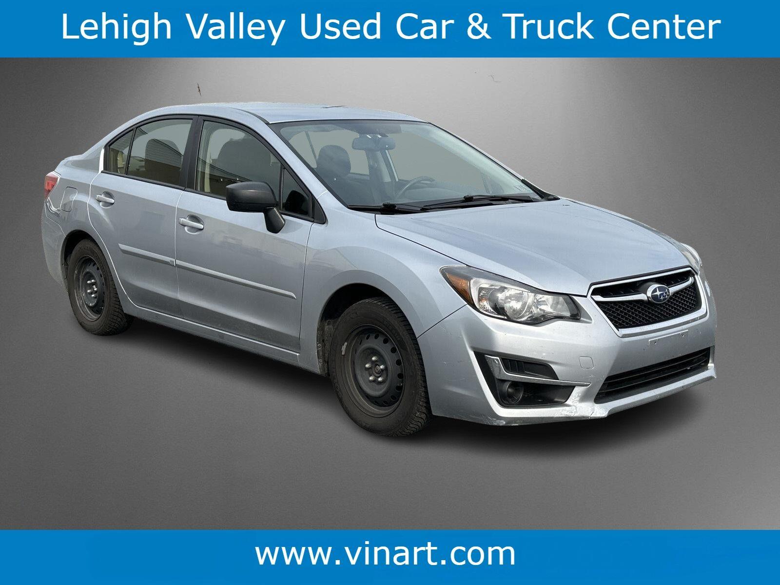 Ice Silver Metallic 2016 Subaru Impreza Sedan All-Wheel Drive Manual