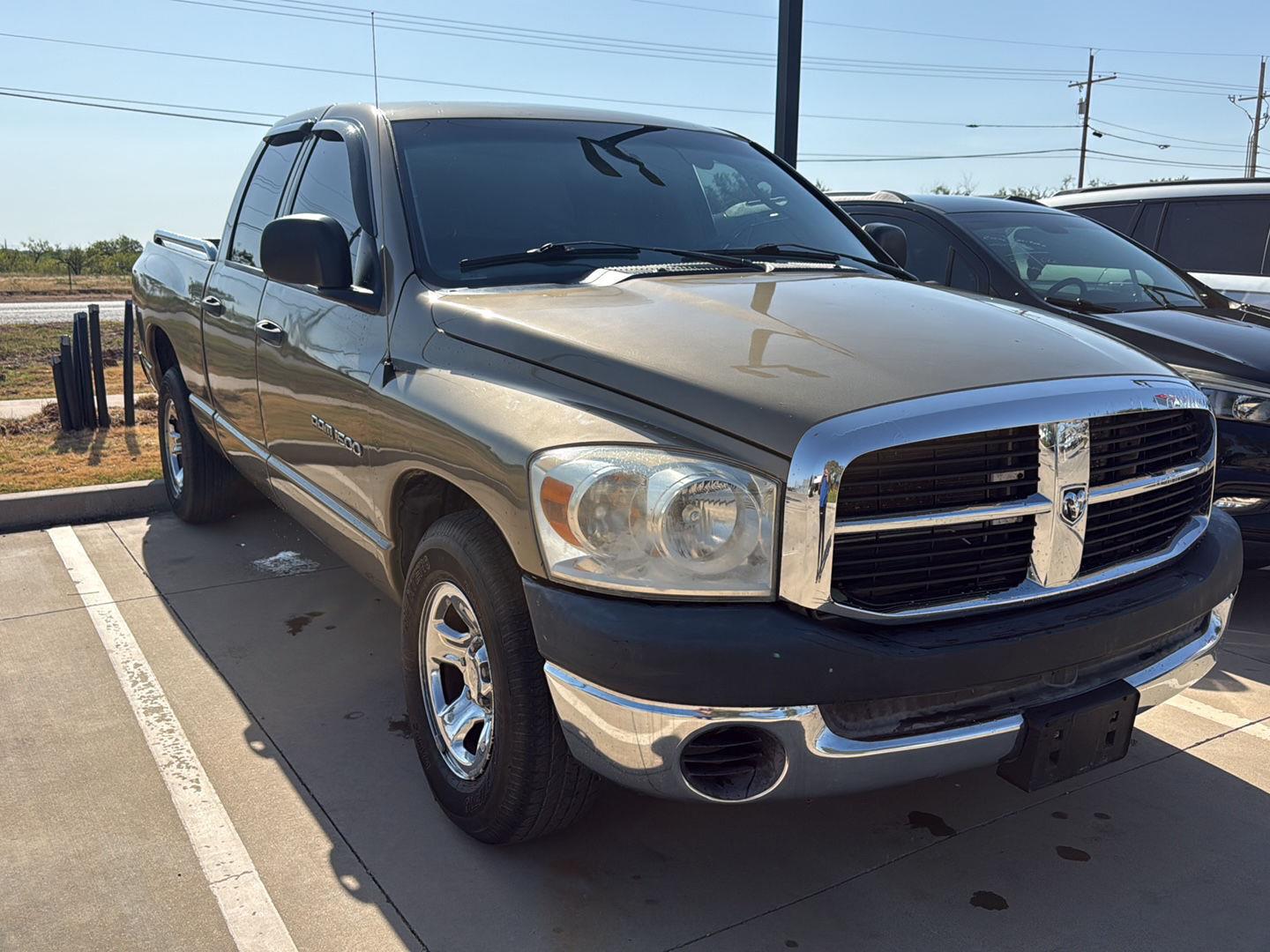 Brown (Light Khaki Metallic Clearcoat) 2007 Dodge RAM 1500 Pickup Truck Rear-Wheel Drive 4-Speed Automatic