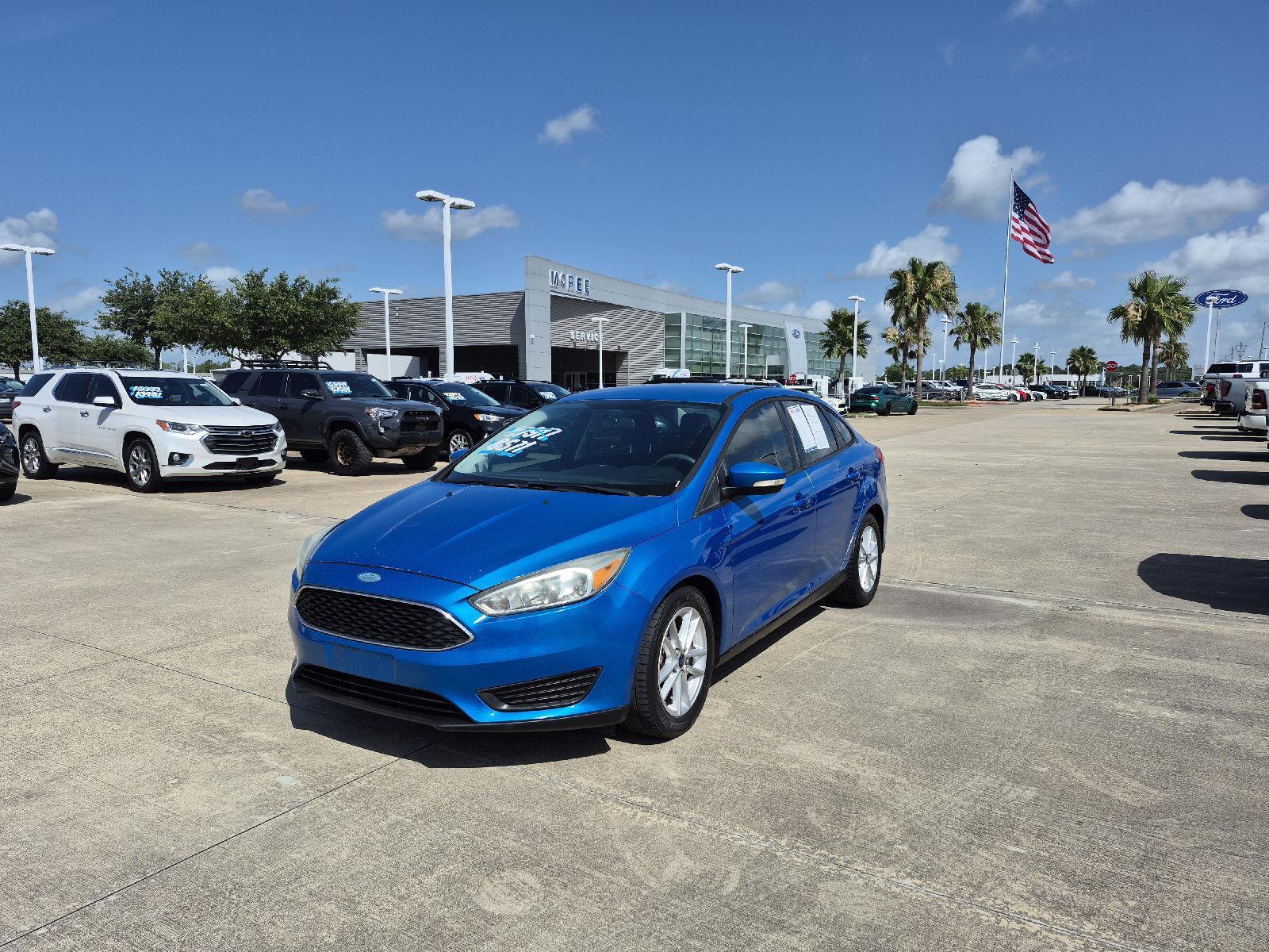 Blue Candy Metallic Tinted Clearcoat 2015 Ford Focus SE Sedan Front-Wheel Drive 6-Speed Automatic