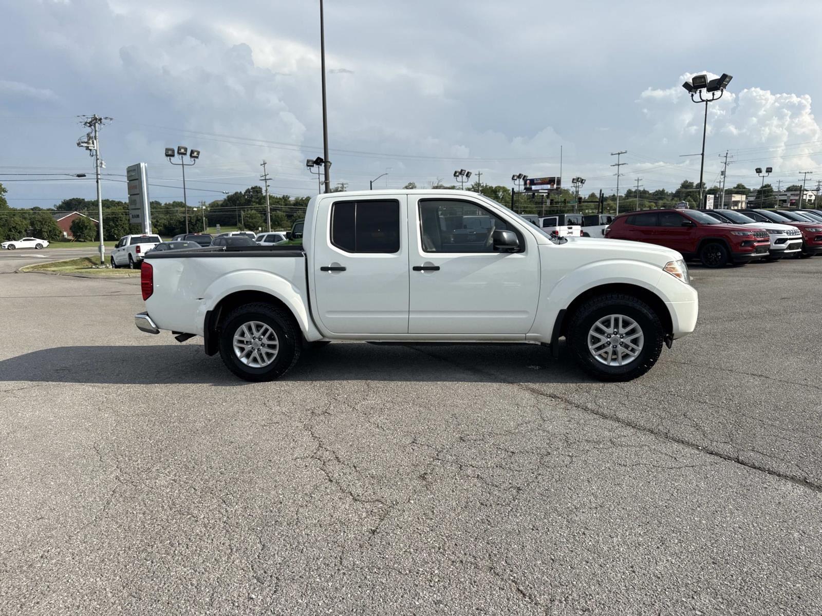 View vehicle photo 4
