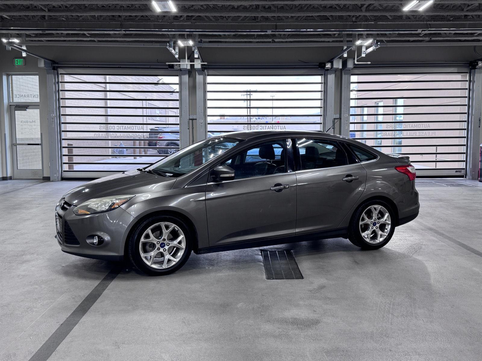 Sterling Gray Metallic 2014 Ford Focus Sedan Front-Wheel Drive 6-Speed Automatic