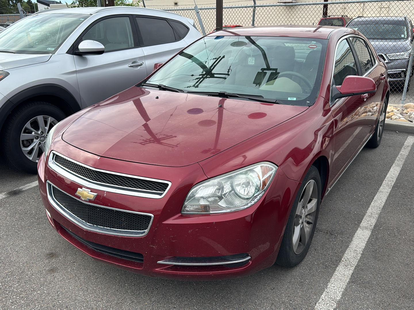 Red Jewel Tintcoat 2009 Chevrolet Malibu Sedan Front-Wheel Drive 6-Speed Automatic