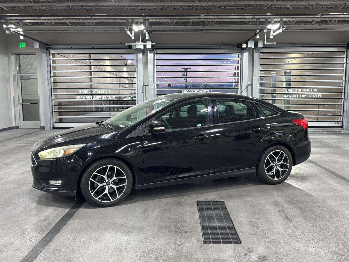 Shadow Black 2017 Ford Focus Sedan Front-Wheel Drive 6-Speed Automatic