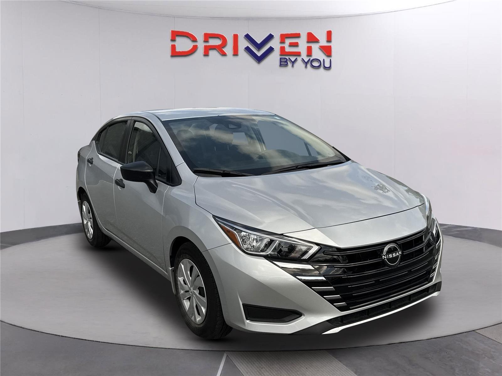 Brilliant Silver Metallic 2024 Nissan Versa Sedan Front-Wheel Drive Continuously Variable Transmission